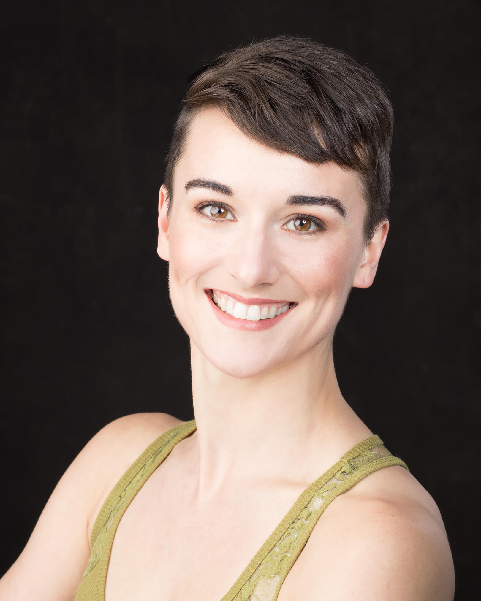 A smiling headshot of Myriam